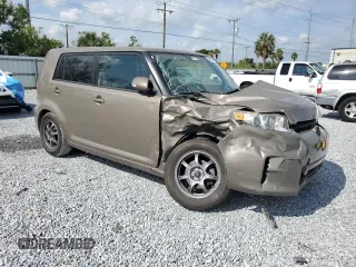 2014 Scion xB z VIN JTLZE4FE5EJ061689, wystawiony jako Copart lot #55420885 z przebiegiem 96 970 mil mil oraz Szkoda całkowita • Salvage title. Historia ofert i sprzedaży dostępna na DreamBid. Obrazek 4.