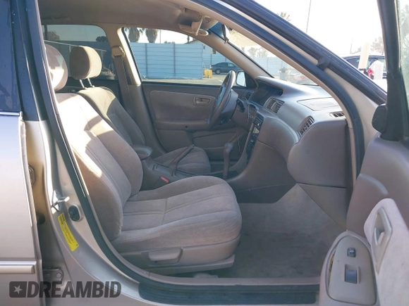 1999 Toyota Camry LE z VIN 4T1BF28K3XU931485, wystawiony jako IAAI lot #41413709 z przebiegiem 148 621 mil mil oraz . Historia ofert i sprzedaży dostępna na DreamBid. Obrazek 5.