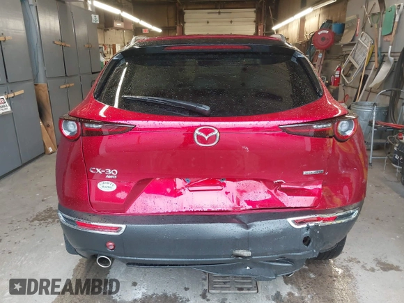 2023 Mazda CX-30 S Premium with VIN 3MVDMBDM5PM518612, listed as a IAAI auction lot 42219265 with 29,135 mi miles and . Bid and sale history available at DreamBid. Image 16.