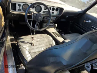 1975 Pontiac Firebird z VIN 2U87S5N582923, wystawiony jako Copart lot #72821784 z przebiegiem 37 718 mil mil oraz Tytuł czysty. Historia ofert i sprzedaży dostępna na DreamBid. Obrazek 8.