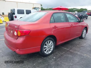 2009 Toyota Corolla with VIN 1NXBU40E39Z022074, listed as a IAAI auction lot 41987902 with 121,206 mi miles. Bid and sale history available at carsss.com. Image 4.