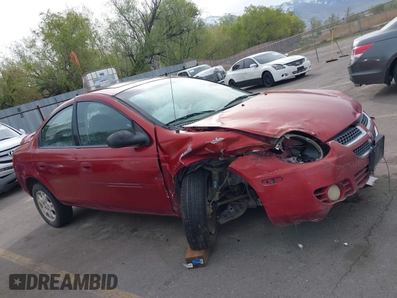 2004 Dodge Neon SXT with VIN 1B3ES56C04D504384, listed as a IAAI auction lot 41988581 with 166,602 mi miles. Bid and sale history available at carsss.com. Image 14.