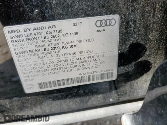 2018 Audi Q3 Premium z VIN WA1BCCFS7JR000434, wystawiony jako Copart lot #54719795 z przebiegiem 108 823 mil mil oraz Szkoda całkowita • Salvage title. Historia ofert i sprzedaży dostępna na DreamBid. Obrazek 14.