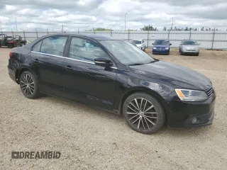2013 Volkswagen Jetta SEL with VIN 3VWLX7AJ0DM453480, listed as a Copart auction lot 63823455 with 132,875 mi miles and Salvage title. Bid and sale history available at DreamBid. Image 4.