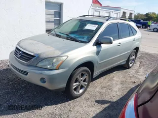 2007 Lexus RX 400h z VIN JTJGW31U272002926, wystawiony jako IAAI lot #41792083 z przebiegiem 227 063 mil mil oraz . Historia ofert i sprzedaży dostępna na DreamBid. Obrazek 2.