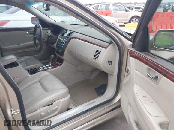 2006 Cadillac DTS 1SC z VIN 1G6KD57Y56U102470, wystawiony jako IAAI lot #40758530 z przebiegiem 149 330 mil mil oraz . Historia ofert i sprzedaży dostępna na DreamBid. Obrazek 5.