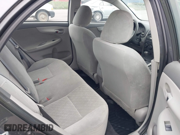 2009 Toyota Corolla z VIN JTDBL40E99J047697, wystawiony jako IAAI lot #42274336 z przebiegiem 184 756 mil mil oraz . Historia ofert i sprzedaży dostępna na DreamBid. Obrazek 8.