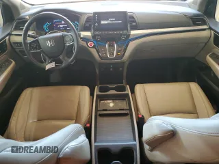 2021 Honda Odyssey Touring with VIN 5FNRL6H89MB018290, listed as a Copart auction lot 55183525 with 77,562 mi miles and Salvage title. Bid and sale history available at DreamBid. Image 8.