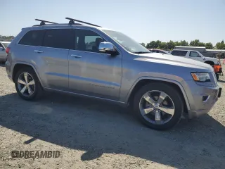 2014 Jeep Grand Cherokee Overland with VIN 1C4RJFCG4EC479545, listed as a Copart auction lot 55178975 with 188,634 mi miles and Clean Title. Bid and sale history available at DreamBid. Image 4.