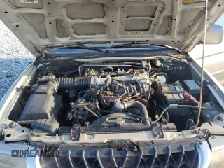 2002 Mitsubishi Montero Limited z VIN JA4LS41R32J066917, wystawiony jako Copart lot #71118894 z przebiegiem 185 475 mil mil oraz Szkody całkowita. Historia ofert i sprzedaży dostępna na DreamBid. Obrazek 12.