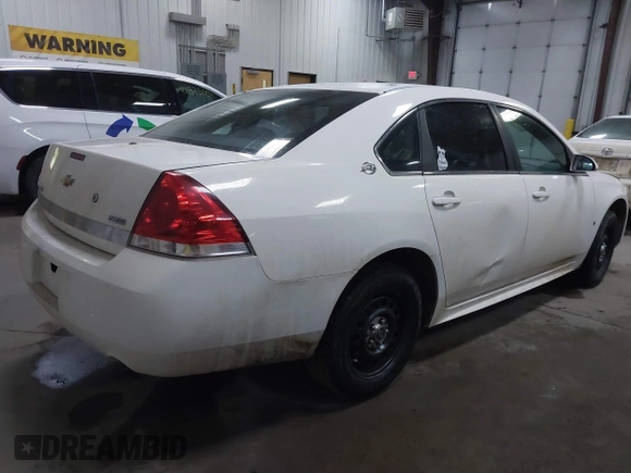 2009 Chevrolet Impala Police Police z VIN 2G1WS57M491315291, wystawiony jako IAAI lot #41877060 z przebiegiem 184 460 mil mil oraz . Historia ofert i sprzedaży dostępna na DreamBid. Obrazek 4.
