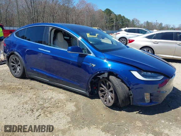 2017 Tesla Model X 90D z VIN 5YJXCBE26HF079022, wystawiony jako IAAI lot #41847954 z przebiegiem 74 940 mil mil oraz . Historia ofert i sprzedaży dostępna na DreamBid. Obrazek 1.