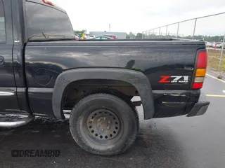 2006 GMC Sierra 1500 SLT with VIN 2GTEK13T561232618, listed as a IAAI auction lot 42086899 with 310,473 mi miles and . Bid and sale history available at carsss.com. Image 16.