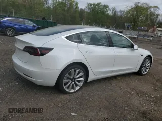 2018 Tesla Model 3 Long Range Battery with VIN 5YJ3E1EAXJF165000, listed as a Copart auction lot 53806195 with 140,448 mi miles and Clean Title. Bid and sale history available at DreamBid. Image 3.
