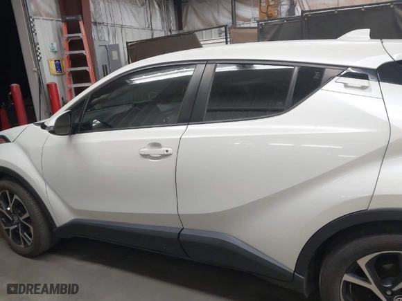 2021 Toyota C-HR LE with VIN JTNKHMBXXM1110696, listed as a IAAI auction lot 41442570 with 44,967 mi miles. Bid and sale history available at carsss.com. Image 14.