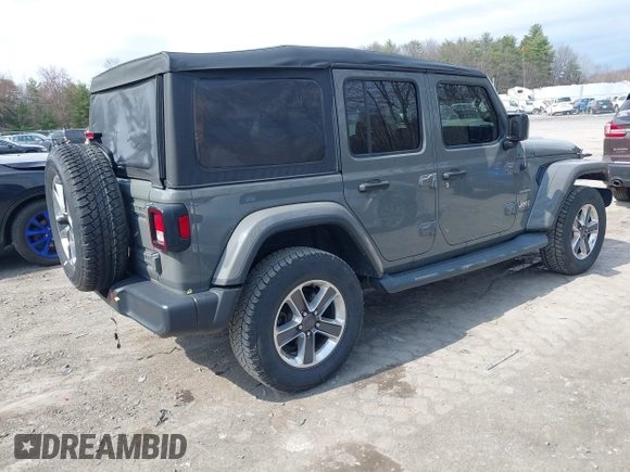 2018 Jeep Wrangler Unlimited Sahara z VIN 1C4HJXEN8JW329816, wystawiony jako IAAI lot #42055851 z przebiegiem 70 298 mil mil oraz . Historia ofert i sprzedaży dostępna na DreamBid. Obrazek 4.