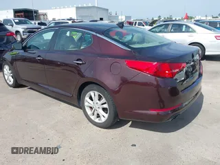 2013 Kia Optima EX with VIN 5XXGN4A74DG148692, listed as a IAAI auction lot 42184122 with 231,133 mi miles and . Bid and sale history available at DreamBid. Image 3.