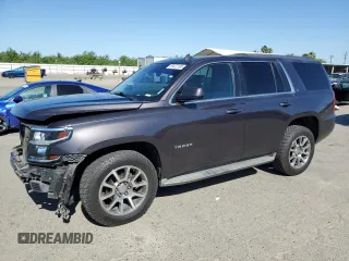 2015 Chevrolet Tahoe LT with VIN 1GNSCBKC5FR271151, listed as a Copart auction lot 55472165 with 159,915 mi miles and Salvage title. Bid and sale history available at DreamBid. Image 1.