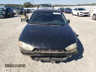 2002 Mitsubishi Mirage DE z VIN JA3AY11A02U013027, wystawiony jako Copart lot #73217194 z przebiegiem 155 865 mil mil oraz Szkoda całkowita • Salvage title. Historia ofert i sprzedaży dostępna na DreamBid. Obrazek 5.