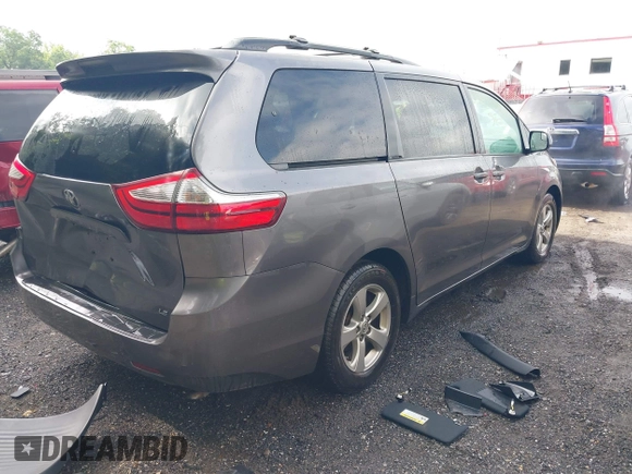 2015 Toyota Sienna LE AAS with VIN 5TDKK3DC8FS632906, listed as a IAAI auction lot 42533867 with 128,980 mi miles and . Bid and sale history available at DreamBid. Image 4.