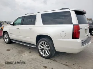 2018 Chevrolet Suburban Premier with VIN 1GNSCJKC5JR184384, listed as a Copart auction lot 53512255 with 161,503 mi miles and Salvage title. Bid and sale history available at DreamBid. Image 2.
