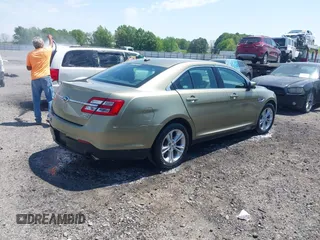 2013 Ford Taurus SEL with VIN 1FAHP2E88DG105557, listed as a IAAI auction lot 42040773 with 157,705 mi miles and . Bid and sale history available at carsss.com. Image 4.