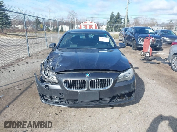 2014 BMW 5 Series 535i xDrive with VIN WBA5B3C52ED534784, listed as a IAAI auction lot 41875567 with 128,533 mi miles and . Bid and sale history available at carsss.com. Image 12.