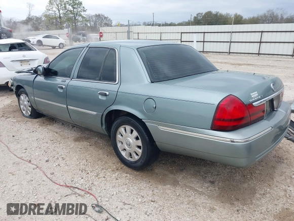 2005 Mercury Grand Marquis LS Premium z VIN 2MEHM75W45X662040, wystawiony jako IAAI lot #41697234 z przebiegiem 214 410 mil mil oraz . Historia ofert i sprzedaży dostępna na DreamBid. Obrazek 3.