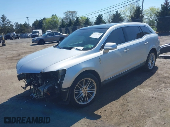 2015 Lincoln MKT EcoBoost with VIN 2LMHJ5AT4FBL00959, listed as a IAAI auction lot 41991763 with 159,687 mi miles and . Bid and sale history available at DreamBid. Image 2.
