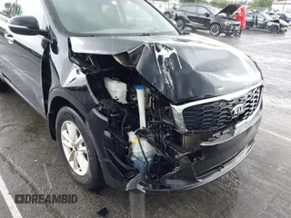 2019 Kia Sorento L z VIN 5XYPG4A39KG584941, wystawiony jako IAAI lot #42236774 z przebiegiem 93 158 mil mil oraz . Historia ofert i sprzedaży dostępna na DreamBid. Obrazek 6.
