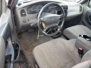 2002 Ford Ranger XL with VIN 1FTYR14V32TA65124, listed as a Copart auction lot 65009025 with 134,746 mi miles and Salvage title. Bid and sale history available at DreamBid. Image 8.
