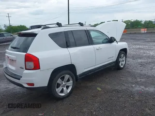 2011 Jeep Compass Latitude with VIN 1J4NT1FB1BD192076, listed as a IAAI auction lot 42121930 with 148,548 mi miles. Bid and sale history available at carsss.com. Image 4.