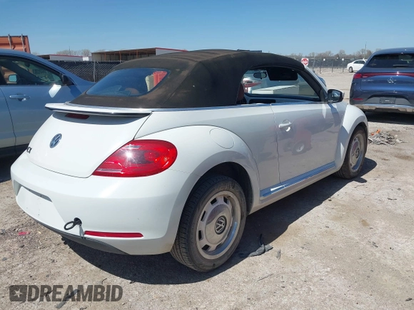 2015 Volkswagen Beetle 1.8T w/Tech with VIN 3VW517AT9FM810122, listed as a IAAI auction lot 41815980 with 72,420 mi miles and . Bid and sale history available at DreamBid. Image 4.