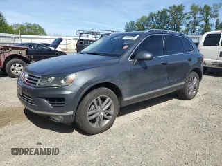 2015 Volkswagen Touareg Lux z VIN WVGEP9BP0FD006992, wystawiony jako Copart lot #59524445 z przebiegiem 169 822 mil mil oraz Szkoda całkowita • Salvage title. Historia ofert i sprzedaży dostępna na DreamBid. Obrazek 1.