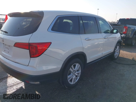 2016 Honda Pilot LX with VIN 5FNYF5H13GB016698, listed as a IAAI auction lot 41685173 with 188,001 mi miles and . Bid and sale history available at DreamBid. Image 4.
