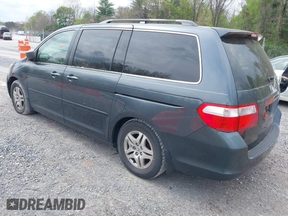 2005 Honda Odyssey EX with VIN 5FNRL38495B004614, listed as a IAAI auction lot 42128185 with 230,247 mi miles. Bid and sale history available at carsss.com. Image 3.