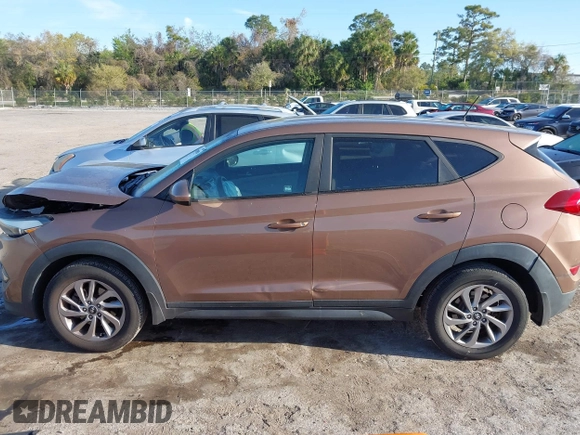 2017 Hyundai Tucson SE with VIN KM8J23A40HU525982, listed as a IAAI auction lot 41790898 with 107,715 mi miles. Bid and sale history available at carsss.com. Image 14.