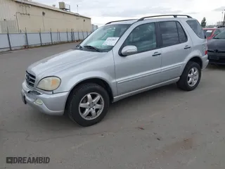 2003 Mercedes-Benz M-Class with VIN 4JGAB75E33A378920, listed as a IAAI auction lot 41914065 with 232,968 mi miles. Bid and sale history available at carsss.com. Image 2.