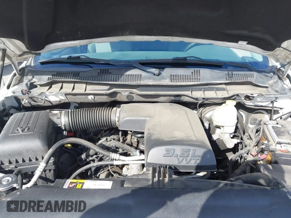 2015 Ram 1500 Big Horn with VIN 1C6RR6GGXFS675250, listed as a IAAI auction lot 41812268 with 200,861 mi miles and . Bid and sale history available at DreamBid. Image 10.