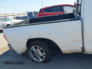 2013 Toyota Tacoma with VIN 5TFTX4CN2DX032744, listed as a IAAI auction lot 41997093 with 213,886 mi miles and . Bid and sale history available at DreamBid. Image 6.