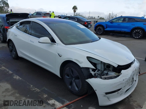 2018 Tesla Model 3 Long Range Battery with VIN 5YJ3E1EA3JF023300, listed as a IAAI auction lot 41925504 with 100,512 mi miles and . Bid and sale history available at DreamBid. Image 1.