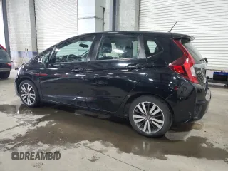 2015 Honda Fit EX-L with VIN 3HGGK5H83FM734672, listed as a Copart auction lot 50918505 with 64,045 mi miles and Salvage Title. Bid and sale history available at carsss.com. Image 2.