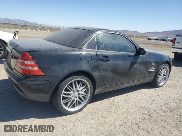1998 Mercedes-Benz SLK-Class with VIN WDBKK47F8WF031084, listed as a Copart auction lot 67831314 with 128,982 mi miles and Clean Title. Bid and sale history available at carsss.com. Image 3.
