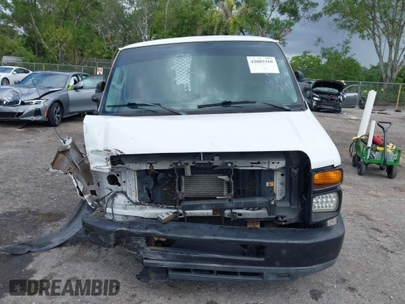 2010 Ford Econoline Cargo Commercial with VIN 1FTNE1EW1ADA63712, listed as a IAAI auction lot 42003310 with Not Provided miles and . Bid and sale history available at carsss.com. Image 12.