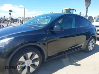 2020 Tesla Model Y Long Range with VIN 5YJYGDEE2LF059177, listed as a IAAI auction lot 41916260 with 66,190 mi miles and . Bid and sale history available at DreamBid. Image 14.