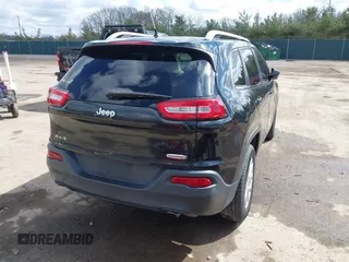 2014 Jeep Cherokee Latitude with VIN 1C4PJMCS6EW219999, listed as a IAAI auction lot 42044695 with 169,533 mi miles and . Bid and sale history available at carsss.com. Image 4.