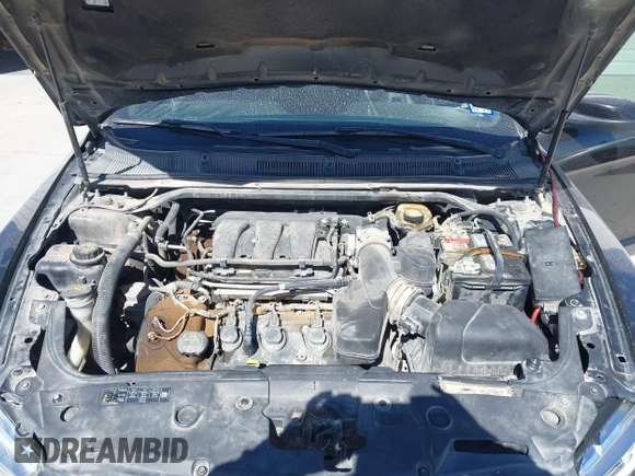 2014 Ford Taurus SEL with VIN 1FAHP2E83EG184976, listed as a IAAI auction lot 41590153 with 177,342 mi miles. Bid and sale history available at carsss.com. Image 10.