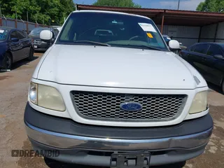 2001 Ford F-150 z VIN 1FTPX17LX1KB15016, wystawiony jako IAAI lot #42320637 z przebiegiem 567 424 mil mil oraz . Historia ofert i sprzedaży dostępna na DreamBid. Obrazek 13.