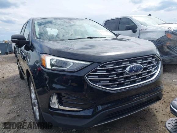 2021 Ford Edge Titanium z VIN 2FMPK3K99MBA16882, wystawiony jako IAAI lot #42214606 z przebiegiem 140 031 mil mil oraz . Historia ofert i sprzedaży dostępna na DreamBid. Obrazek 12.