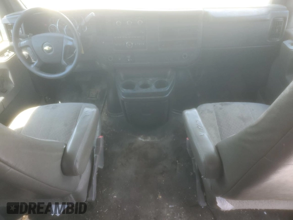 2012 Chevrolet Express Passenger 1LT z VIN 1GAZG1FG6C1144110, wystawiony jako Copart lot #56135025 z przebiegiem 145 093 mil mil oraz Szkoda całkowita • Salvage title. Historia ofert i sprzedaży dostępna na DreamBid. Obrazek 8.